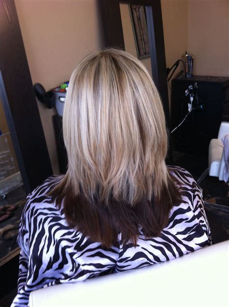 blonde hair with color underneath|blonde on top brown underneath.